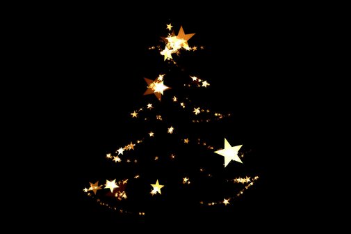Ein schwarzes Bild mit einem Weihnachtsbaum aus Lichtern